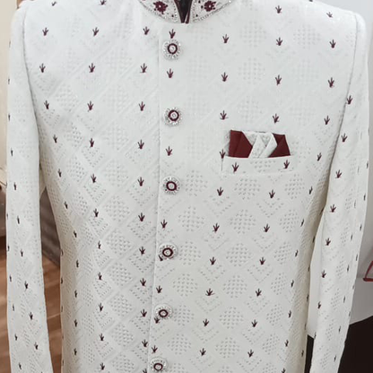 White sherwani with maroon embroidery