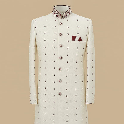 White sherwani with maroon embroidery