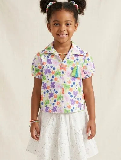 Customer review photo showing a young girl wearing an Irtevo printed top